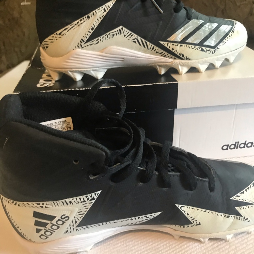 cleated athletic shoes